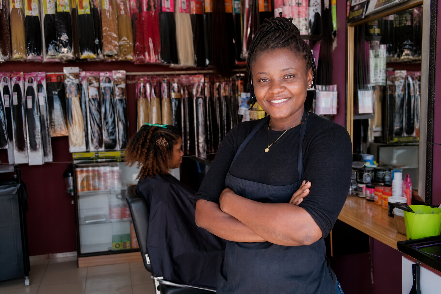 Salon owner standing in her hair studio